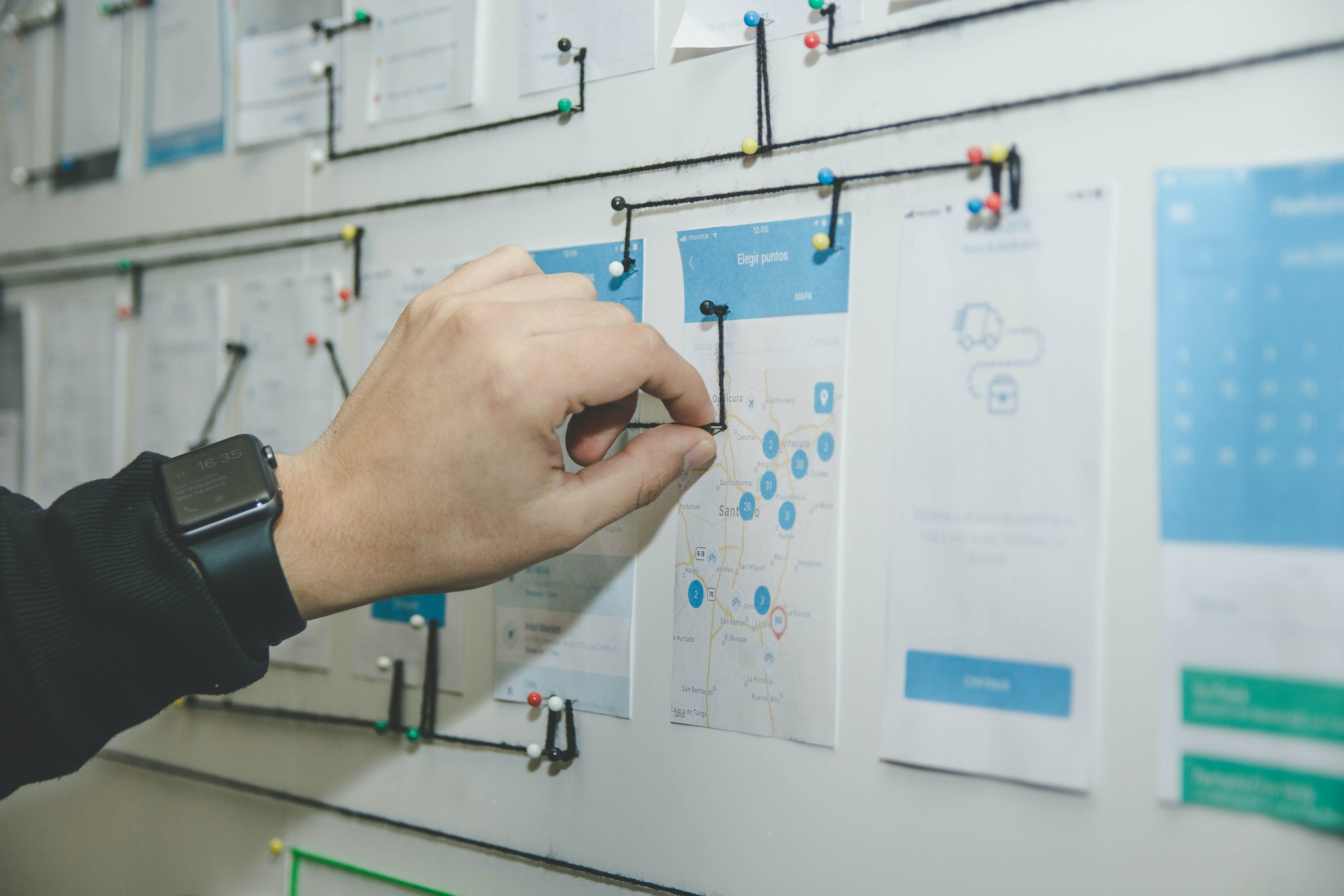 guy working and pointing on a whiteboard