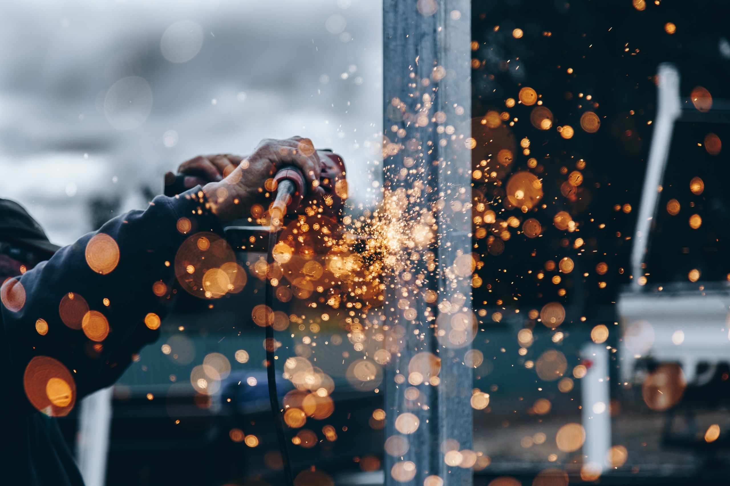 photography of a person welding